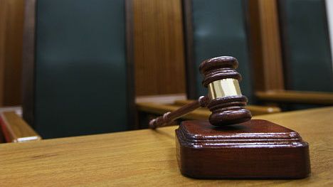 В Красноярском крае экс-начальник ГИБДД получил десять лет за торговлю номерами